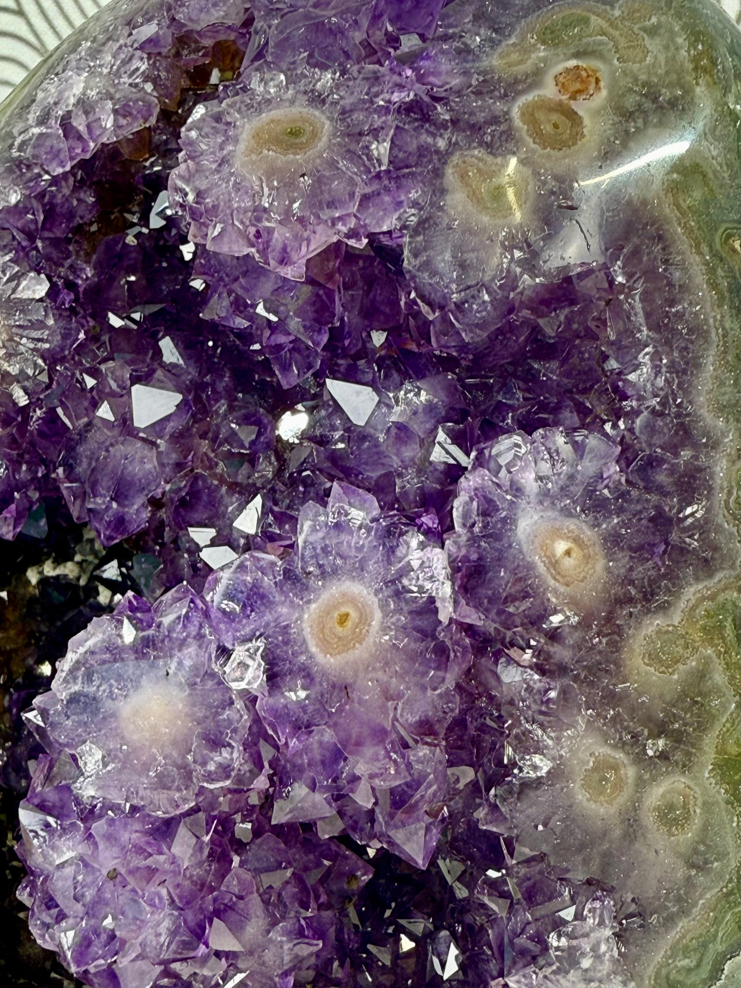 purple orange amethyst with pink stalactite eyes with stand