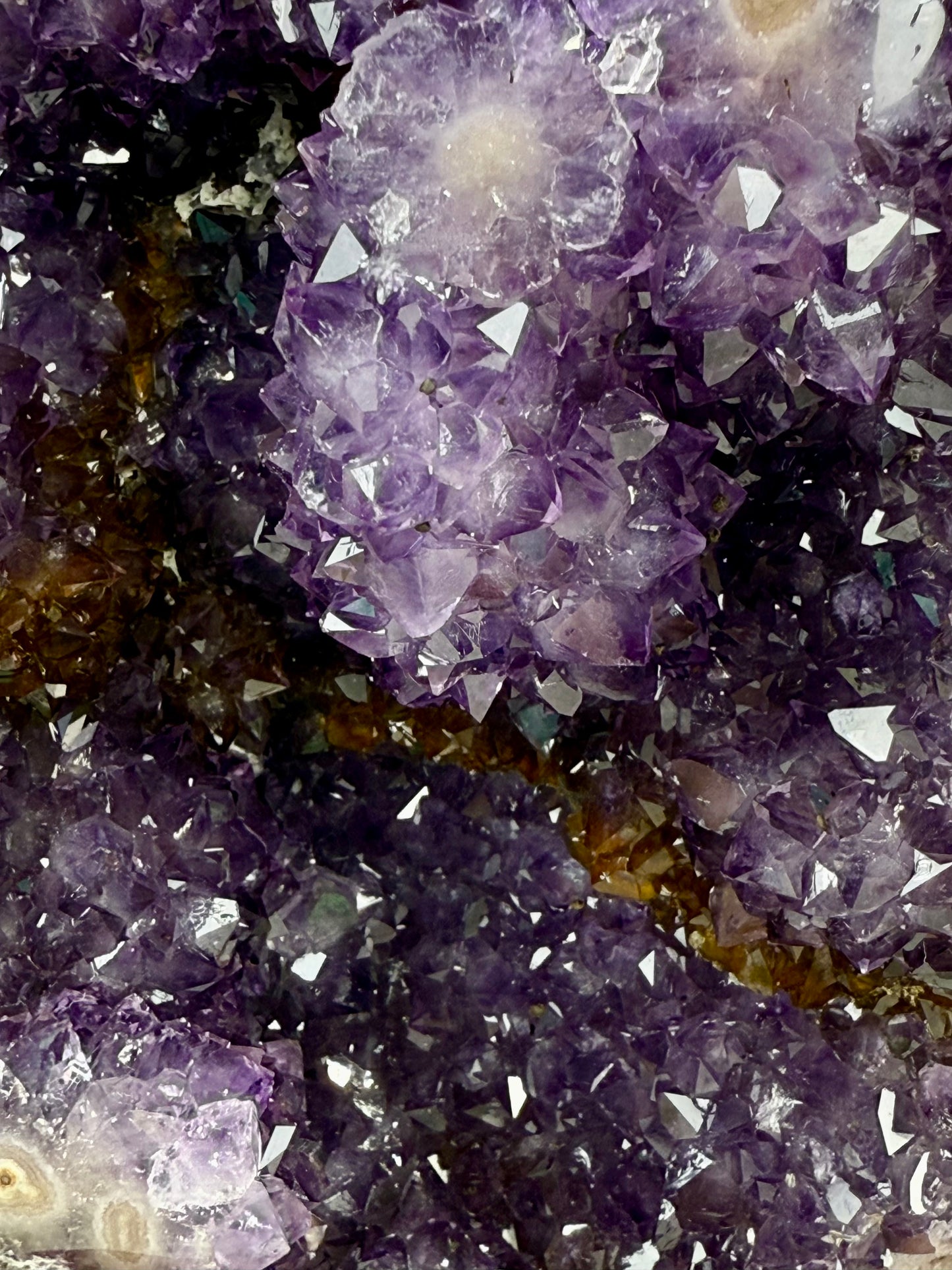 purple orange amethyst with pink stalactite eyes with stand