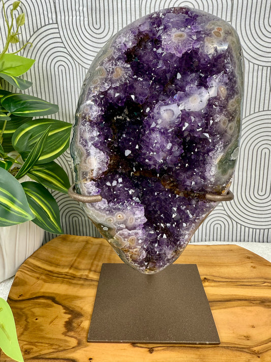 purple orange amethyst with pink stalactite eyes with stand